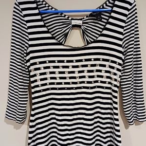 Never worn black and white top. Stone detail on the front.